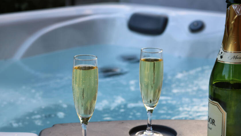 chalet holiday morzine competition with hot tub and champagne glasses