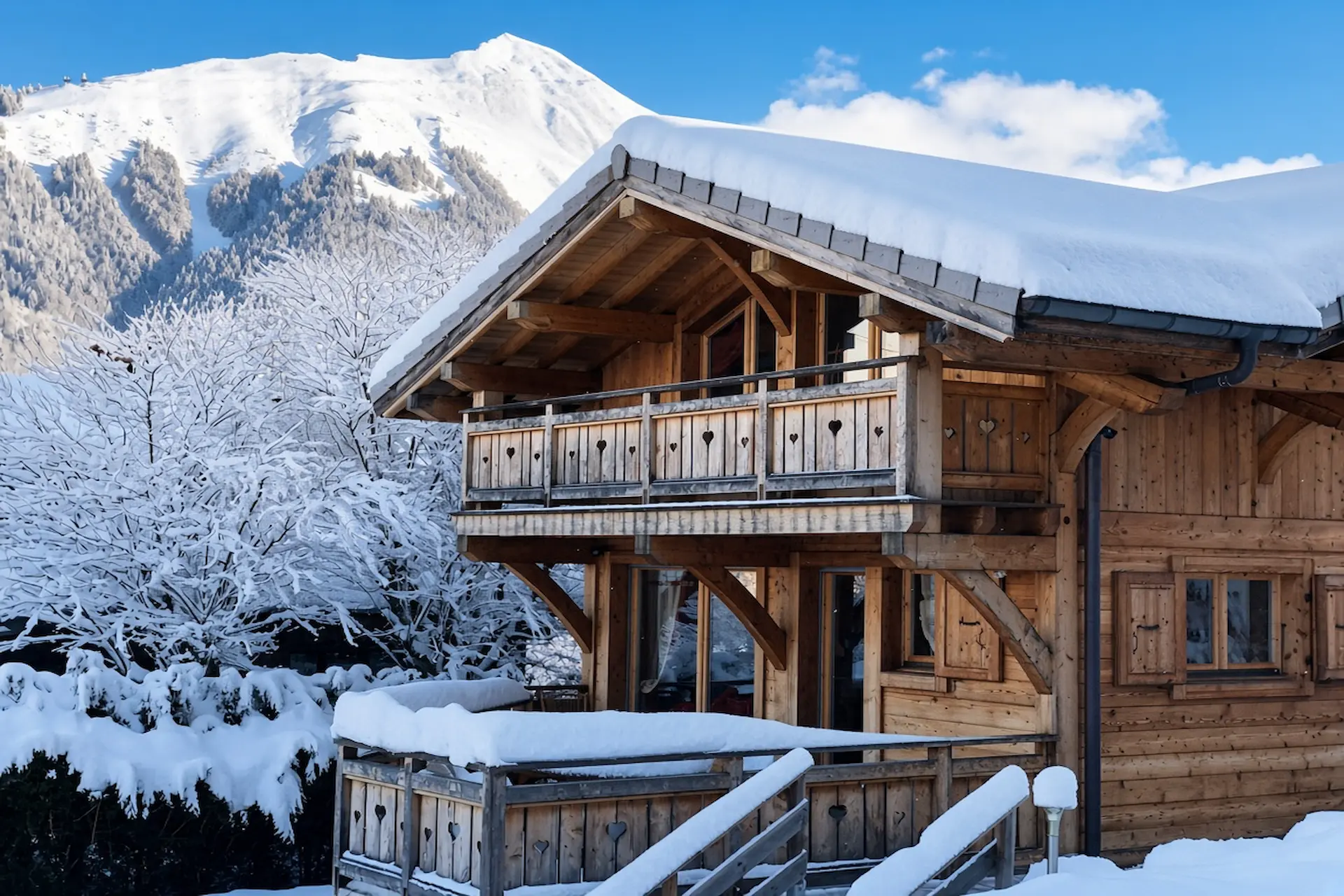 Catered chalets Morzine with snowy mountain backdrop